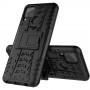 Противоударный двухкомпонентный силиконовый матовый непрозрачный чехол с поликарбонатными вставками экстрим защиты с ножкой-подставкой и текстурным покрытием Шина для Realme C15, цвет Черный